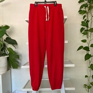 Red joggers size L